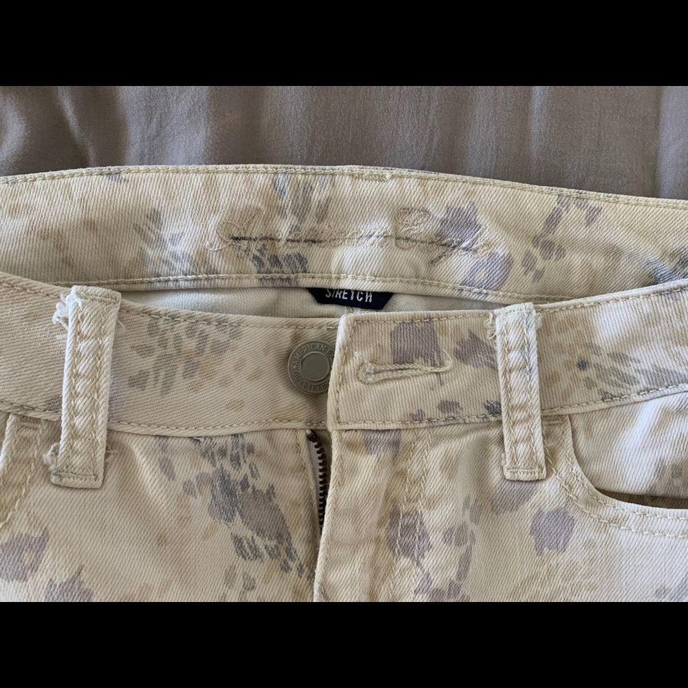 White background cheetah jeans/jeggings